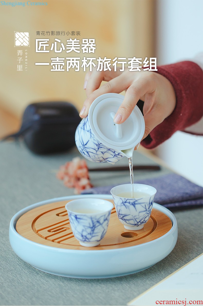 Jingdezhen ceramic kung fu tea set suit portable travel outside BaoHu contracted tea cup crack cup a pot of two cups