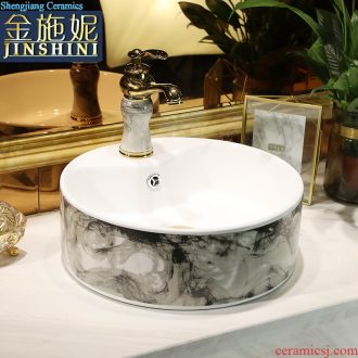 The stage basin ceramic washing basin creative Nordic modern Chinese circular home wash gargle art basin