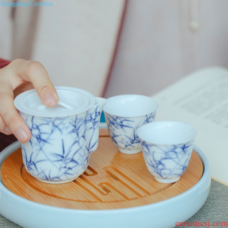 Jingdezhen ceramic kung fu tea set suit portable travel outside BaoHu contracted tea cup crack cup a pot of two cups