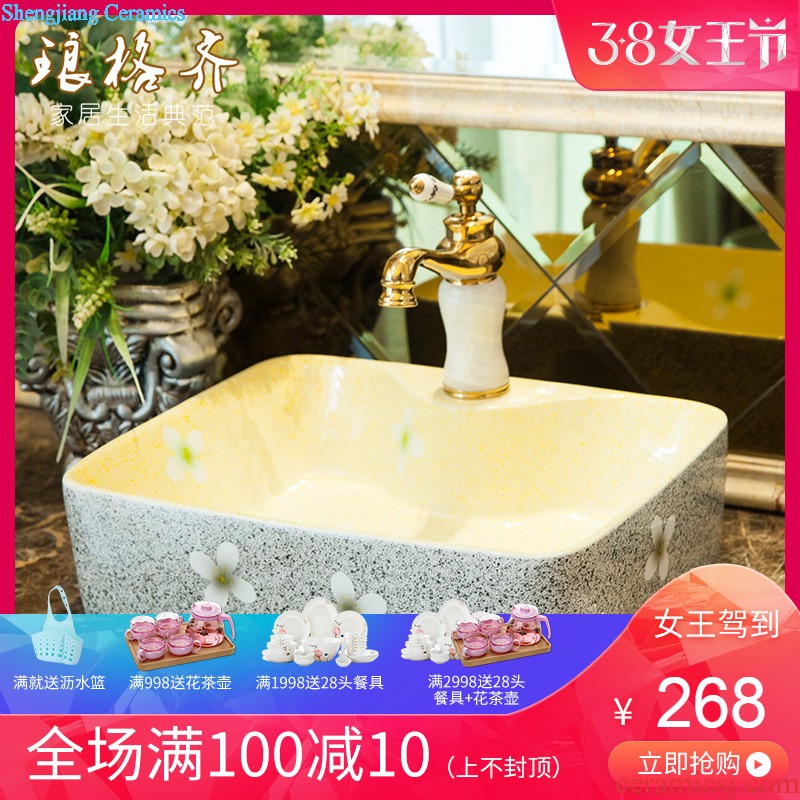 Koh larn, qi ceramic basin sinks art stage of the basin that wash a face toilet ellipse porcelain white yellow glaze Jin Fengyu