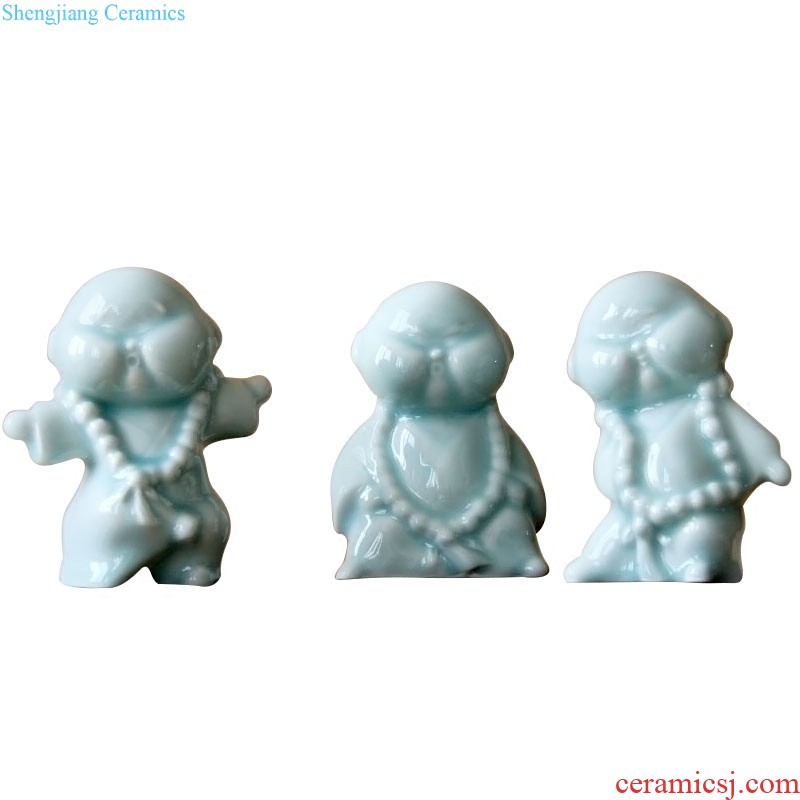 Rain tong home | jingdezhen ceramics creative home hand shadow celadon kung fu boy little monk ceramic furnishing articles