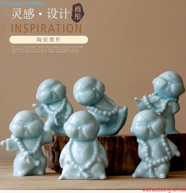 Rain tong home | jingdezhen ceramics creative home hand shadow celadon kung fu boy little monk ceramic furnishing articles