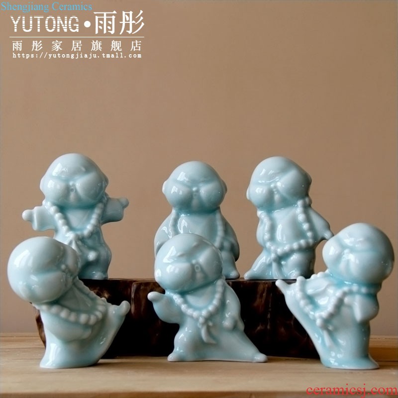 Rain tong home | jingdezhen ceramics creative home hand shadow celadon kung fu boy little monk ceramic furnishing articles