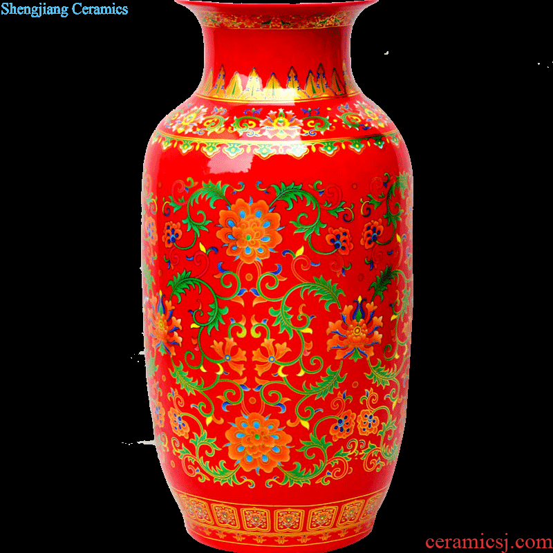 Jingdezhen ceramic masters hand-painted vases, flower arranging machine carved lotus pomegranate bottles of home sitting room adornment is placed