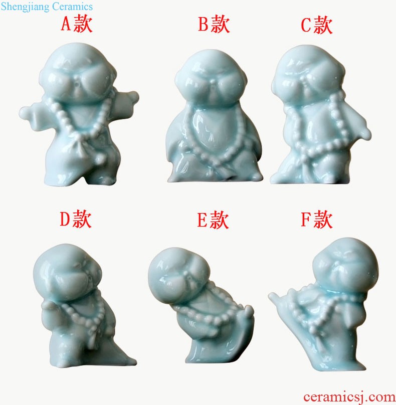 Rain tong home | jingdezhen ceramics creative home hand shadow celadon kung fu boy little monk ceramic furnishing articles