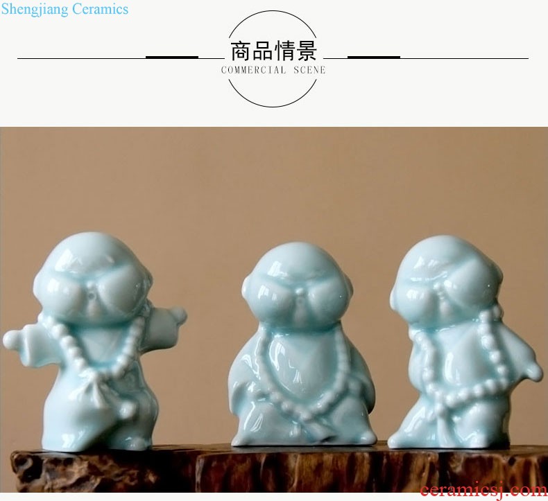 Rain tong home | jingdezhen ceramics creative home hand shadow celadon kung fu boy little monk ceramic furnishing articles