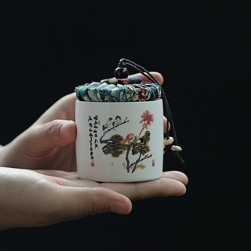 Pu 'er tea pot small ceramic portable tea packaging flower wholesale mini gift box sealed storage jar