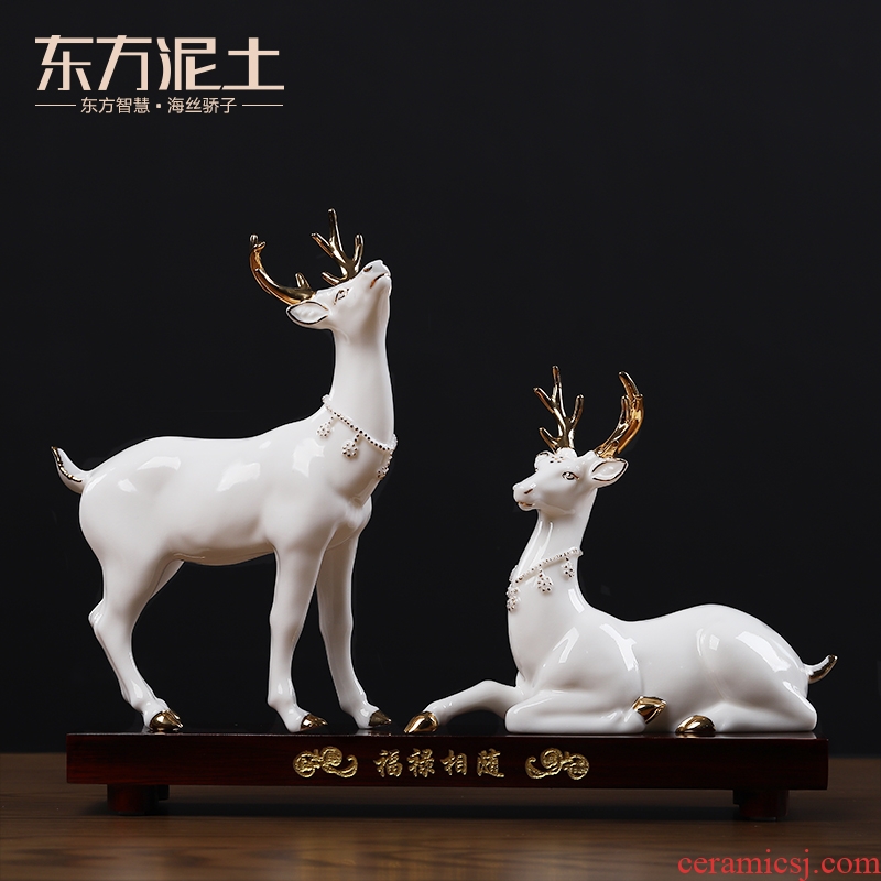 East mud dehua white porcelain its fuels the deer place to live in the living room TV cabinet decoration/blessing