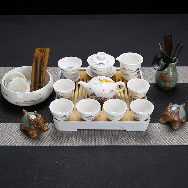 Suet jade ceramic travel kung fu tea set a pot of four cups of portable Japanese contracted crack belt filter tea tray