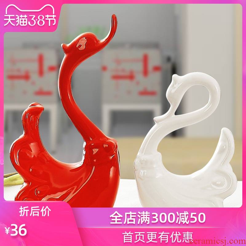 The Sequence of the strong household act the role ofing is tasted creative new home decoration wedding present red and white couples swan furnishing articles ceramic arts and crafts