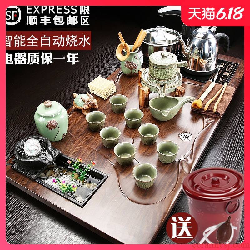 A complete set of kung fu tea set household automatic integrated solid wood tea tray was sitting room tea tea sea tea cups