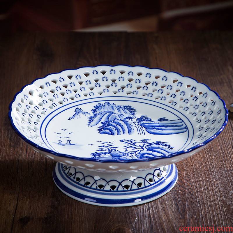 387 jingdezhen ceramic glaze color blue and white landscape circular hollow out fruit bowl creative home fruit basket