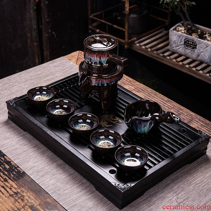 Alluvial gold all red glaze, semi - automatic kung fu tea set home stone mill lazy people make tea ware ceramic teapot lamp
