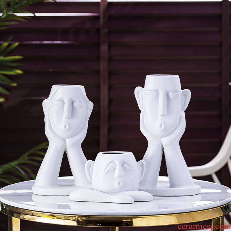 The modern minimalist art ceramic figures place ins vases, table creative living room interior decoration decoration