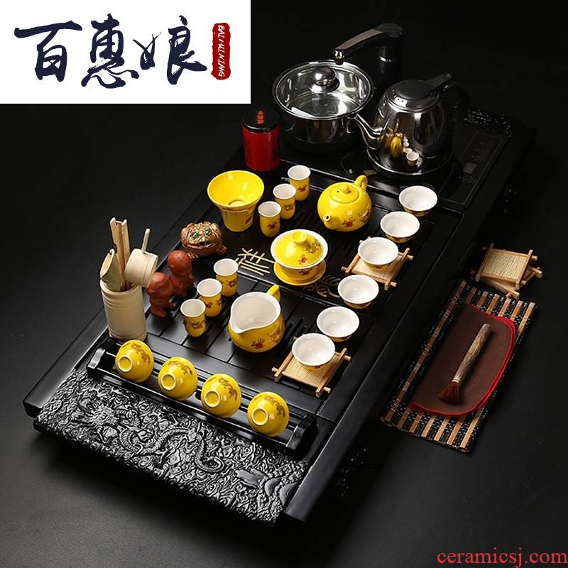 Four unity induction cooker (niang kung fu tea set tea tray was purple sand cup lid bowl of tea set