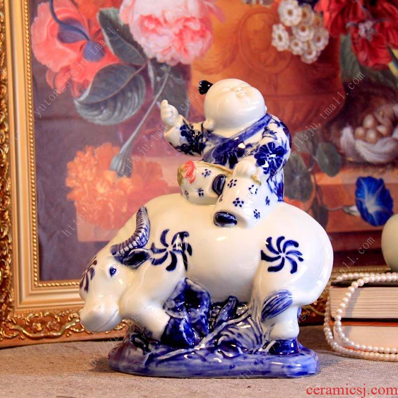 Jingdezhen blue and white porcelain is placed by hand ceramic dolls cowherd boys decorative furnishing articles process household act the role ofing is tasted