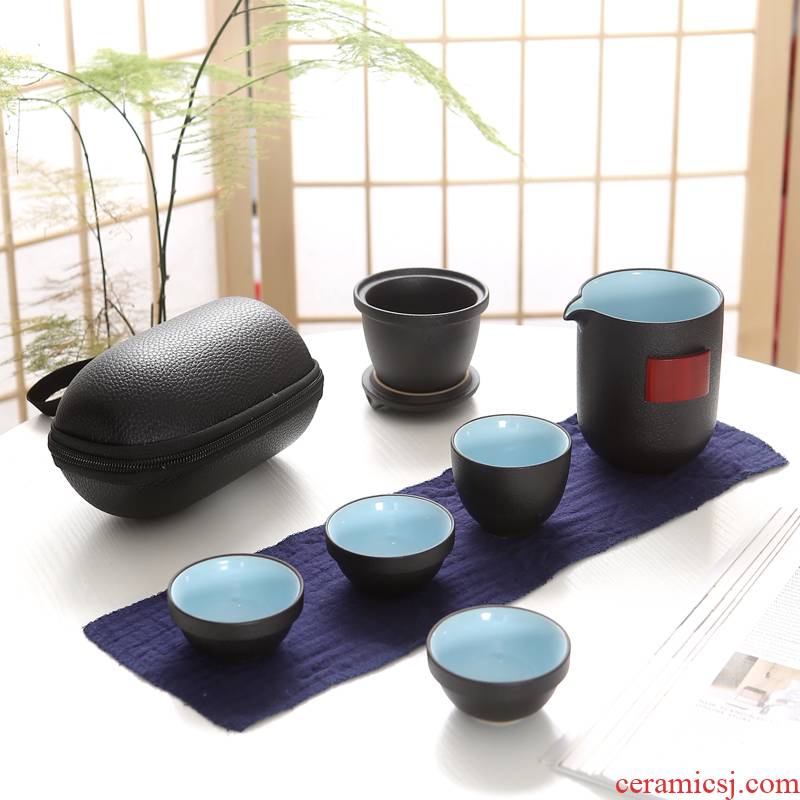 Simple RenXin travel tea set of black suit portable kung fu tea packet four cups to crack a pot of CPU