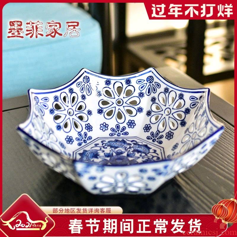 The New Chinese jingdezhen porcelain ceramics hollow - out compote of fruit basin for plate household dry fruit bowl sitting room tea table is received