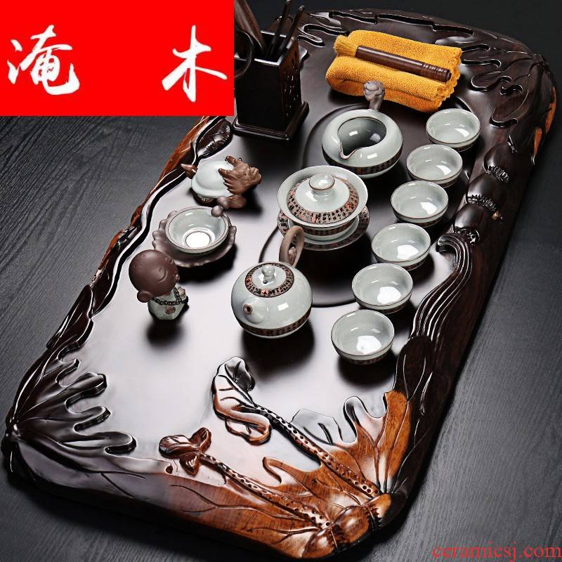 Submerged wood blocks side carved ebony tea tray was a complete set of blue and white elder brother up with household violet arenaceous kung fu tea set tea sea