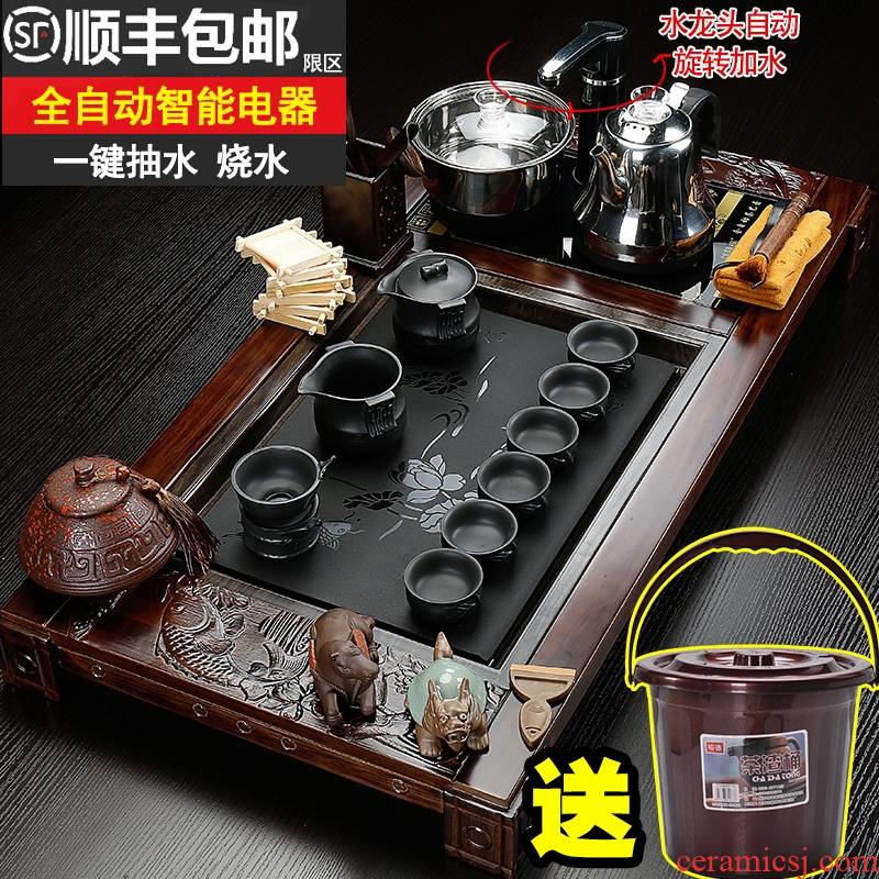 Qiao mu home tea set ceramic kung fu suit of a complete set of automatic electric magnetic furnace solid wood tea tray, tea cups
