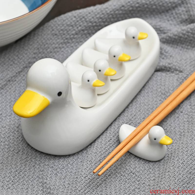 Creative hand - made ceramic white suit cartoon express chopsticks holder frame duck chopsticks chopsticks pillow small place