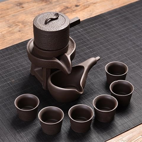 Tea set home stone mill creative ceramic teapot kung fu Tea cup half full automatic ⒅ ⒅.