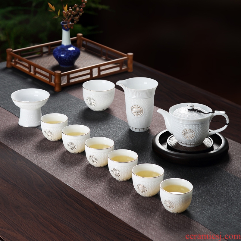 Red the jingdezhen ceramic hand - made relief the see colour white porcelain kung fu tea set household contracted with a complete set of tea