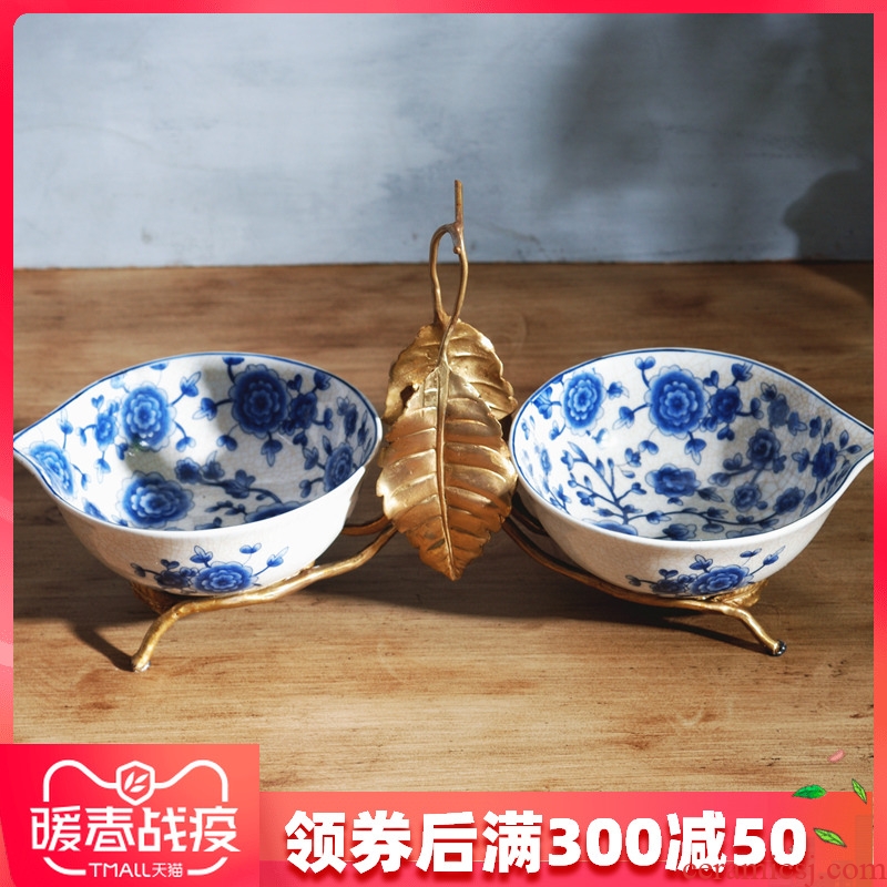 The New Chinese blue and white porcelain with copper fruit bowl dried fruit bowl sitting room home furnishing articles fruit dish of American creative move ceramics