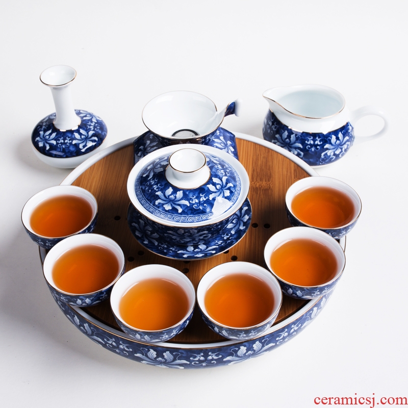 NiuRen blue - and - white kung fu tea set round dry travel portable ceramic bamboo tea tray was Japanese tea table set
