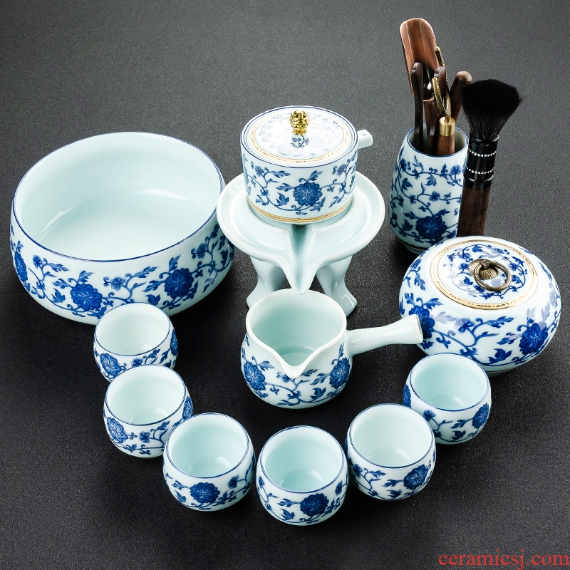 NiuRen blue and white porcelain tea set suit household whole semi - automatic creative stone mill lazy kung fu tea tea cups