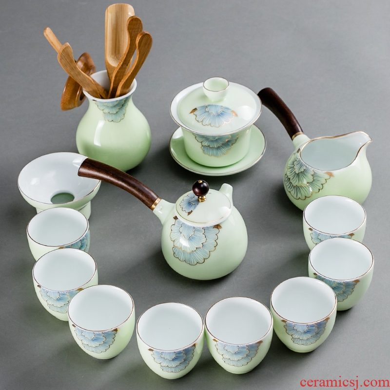 NiuRen household contracted ceramic celadon kung fu tea with manual office of a complete set of tea cups lid bowl suit