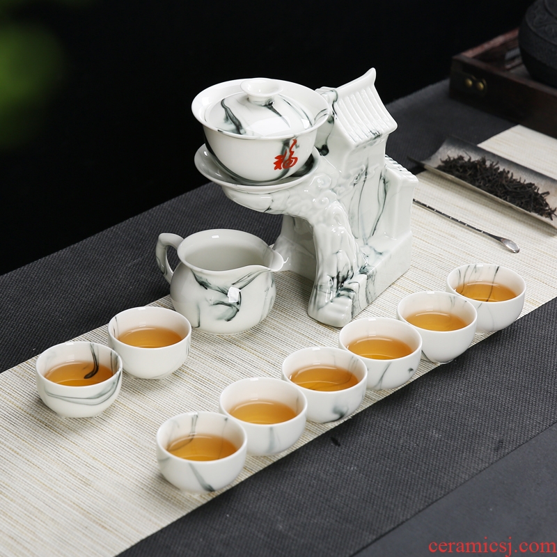 Innovative ink kung fu tea set ceramic gift box of a complete set of lazy hot tea. Preventer household whole semi - automatic teapot