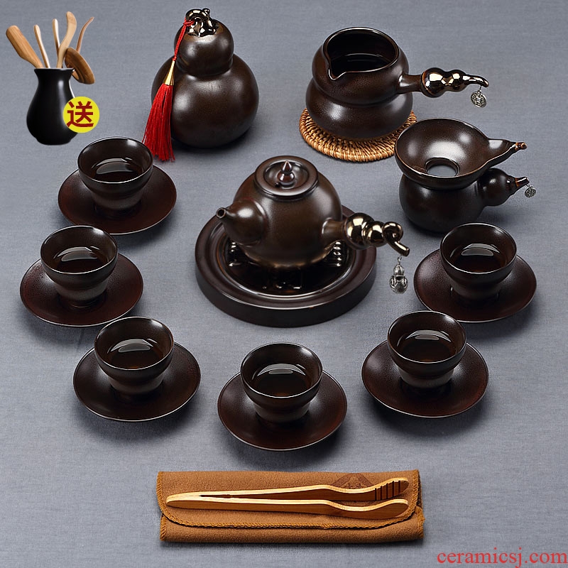 Ceramic teapot suit household creative tea modern kung fu tea tea cups of black small set of simple lazy people