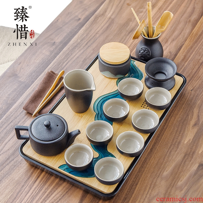 By understanding the modern black ceramic kung fu tea set household contracted mini Japanese tea tea tray of a complete set of the teapot