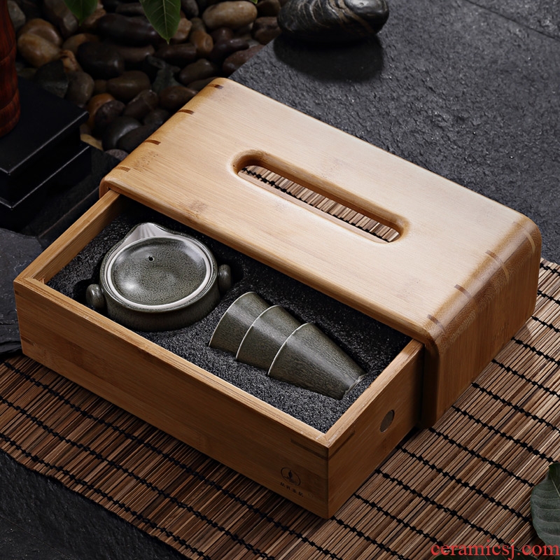 The Mini portable travel tea set is suing kung fu ceramic cups of a complete set of creative household bamboo tea tray