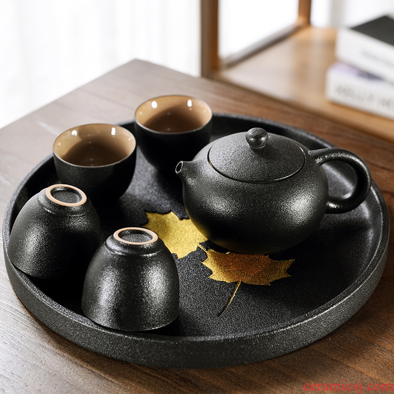 Japanese dry tea sets kung fu tea cups of black pottery and porcelain of a complete set of I and contracted household tea tea tray tea sets