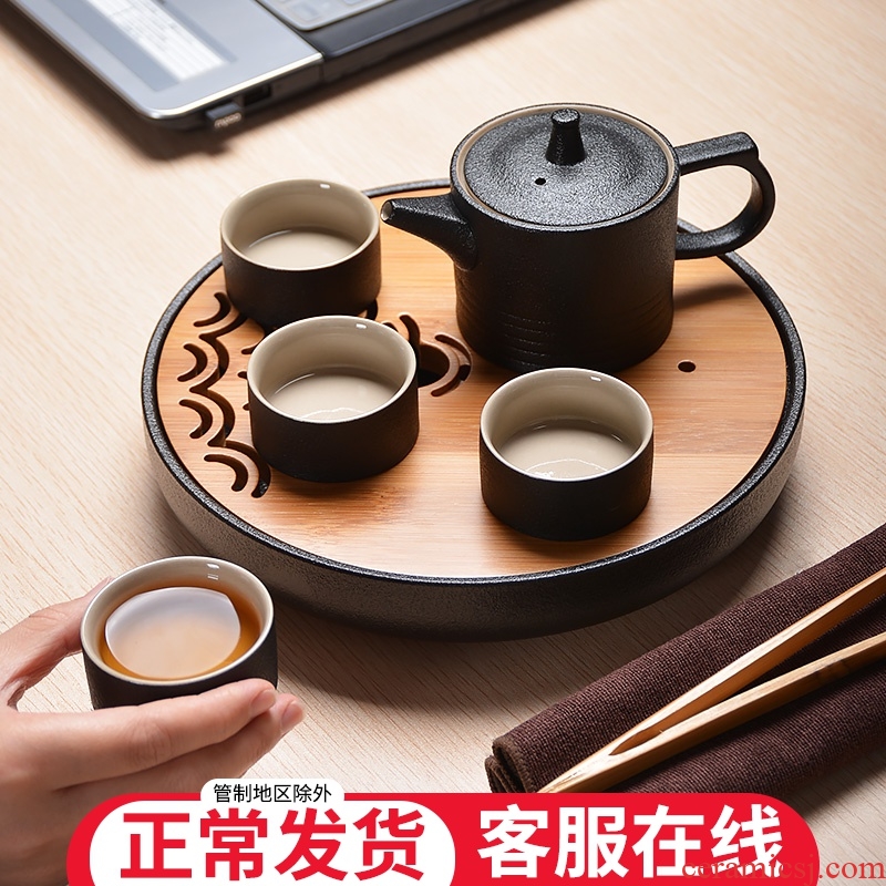 Black pottery tea set suit Japanese household contracted and I ceramic dry tea tray 4 people of a complete set of kung fu tea cups