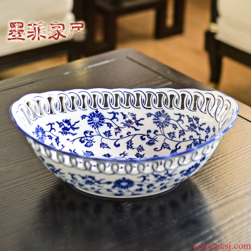New Chinese style restoring ancient ways of jingdezhen blue and white porcelain ceramic hollow out fruit bowl dried fruit tray table sitting room adornment is placed