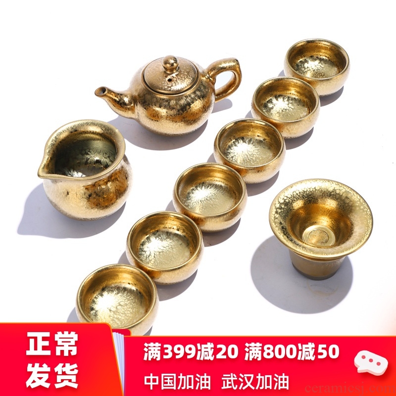 Is the best product of a complete set of kung fu tea sets ceramic drop light gold hand tea tureen teapot household gifts