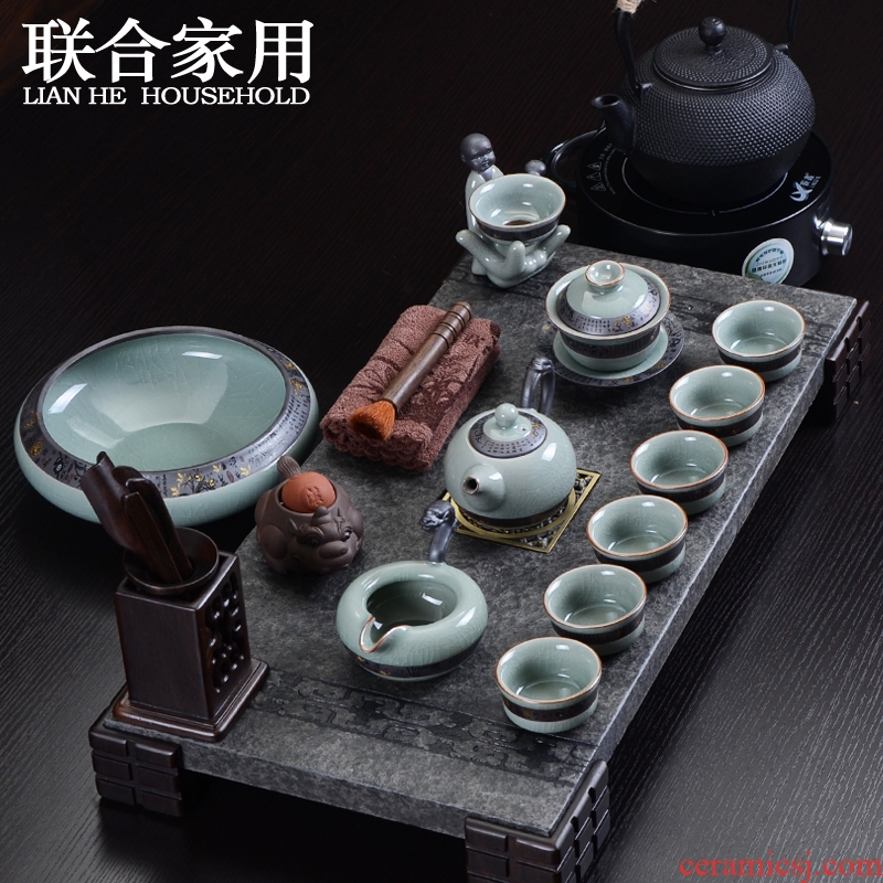 To be household natural stone tea tray was sharply purple suit black stone electric TaoLu kung fu tea set