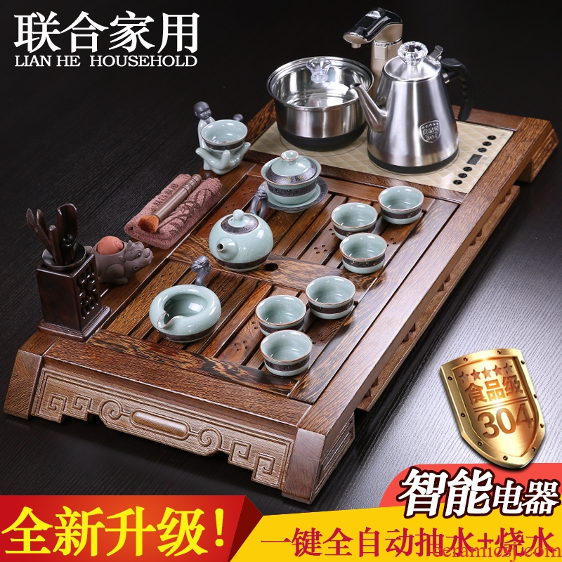 To be household chicken wings wood tea tray and induction cooker creative coarse pottery stone mill automatic kung fu tea set