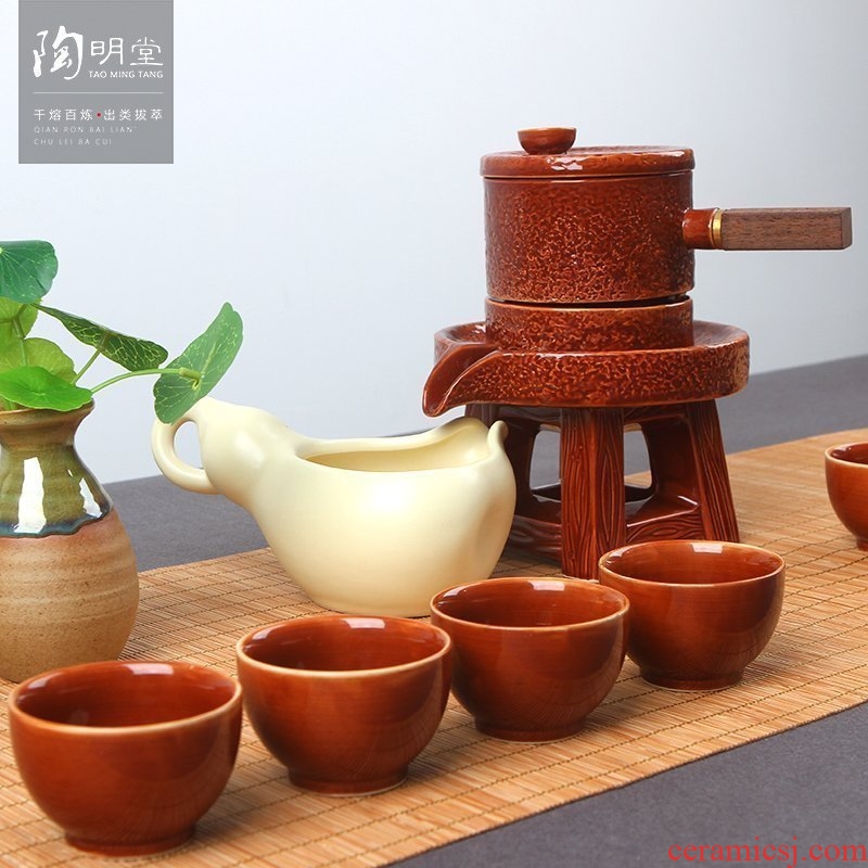 TaoMingTang tea set household automatic restoring ancient ways of a complete set of creative stone mill ceramic kung fu tea set lazy people prevent hot