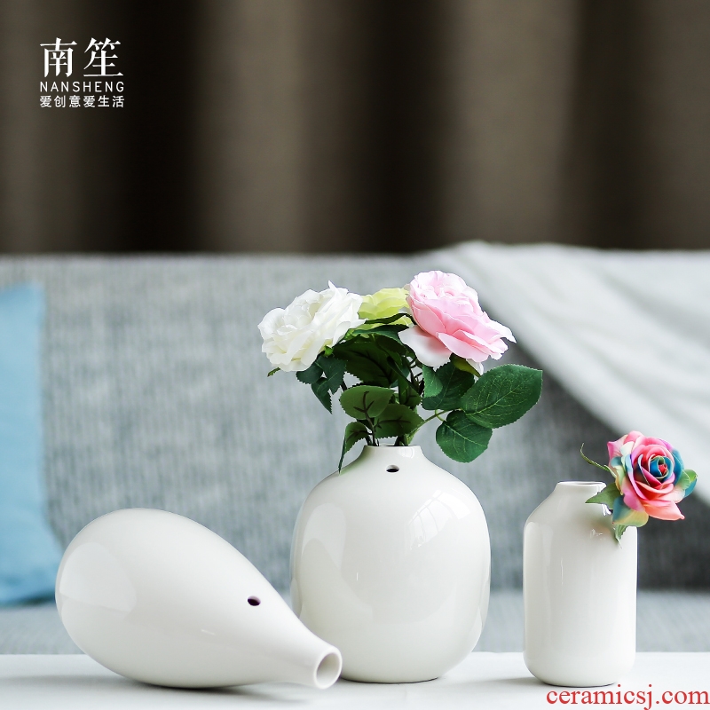 Nan sheng mesa of I and contracted household act the role ofing is tasted furnishing articles white ceramic vase simulation flowers, dried flowers, floral outraged