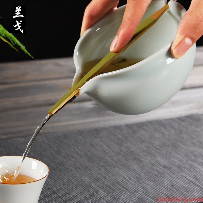 Having a Japanese kung fu tea, green tea teapot fair ceramic bowl tea with tea sea of flowers and the plants