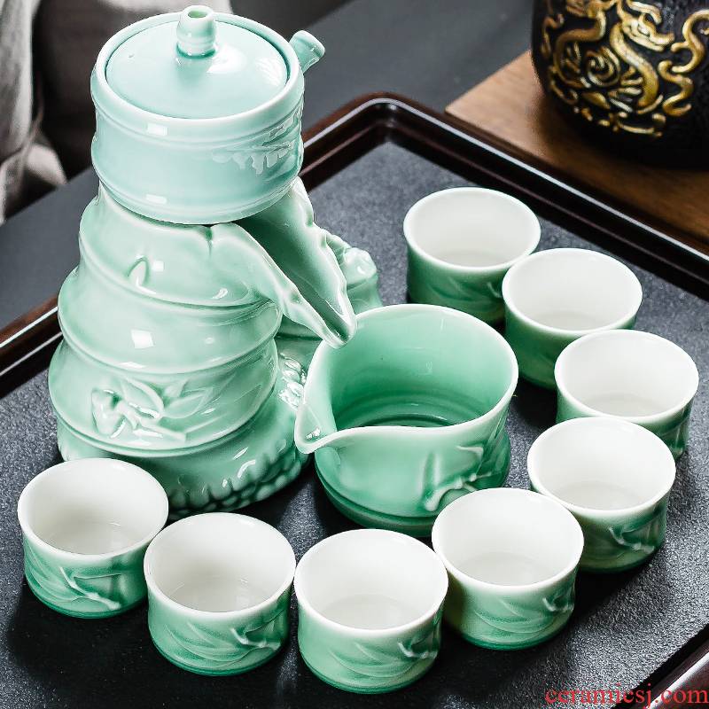 NiuRen creative ceramic celadon kung fu tea set the whole household contracted lazy semi - automatic tea teapot rotation