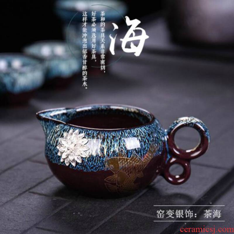 Ya xin company hall temmoku glaze ceramic fair coppering. As silver cup large up with tea and a cup of tea tea machine tools