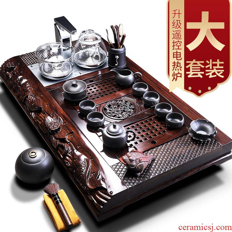 Tang big wooden embossment household ebony ground tea ceramic kung fu tea set office remote control electric heating furnace