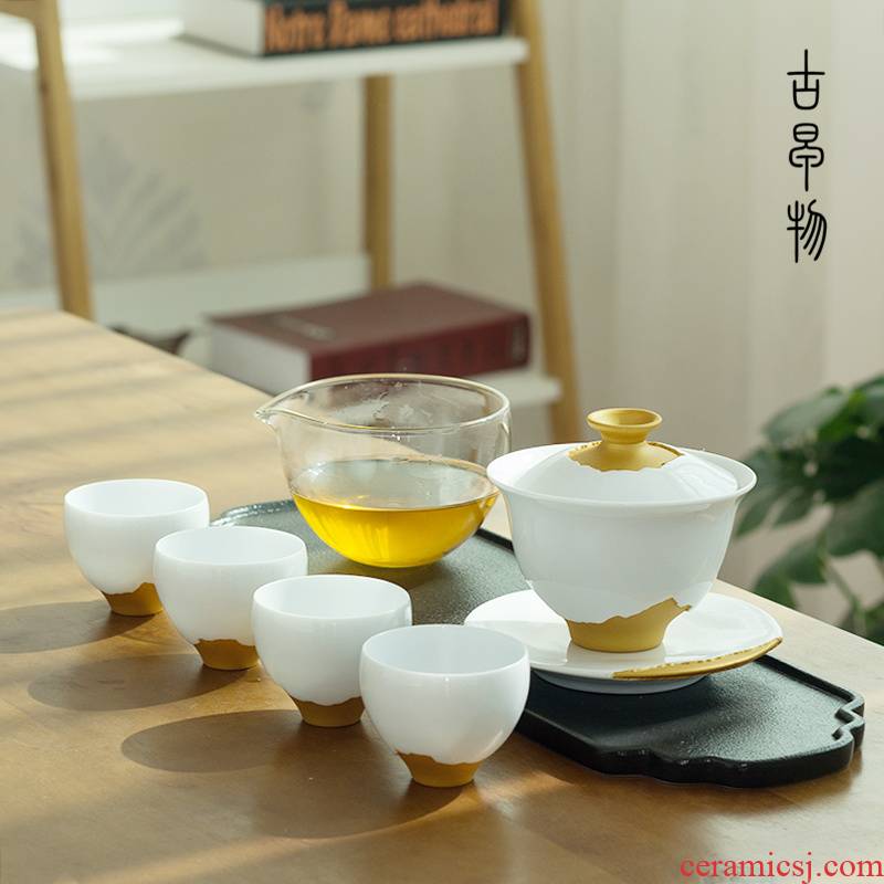 The Set of gold que tea Set household contracted and I Japanese kung fu tea Set gift box of a complete Set of ceramic tureen