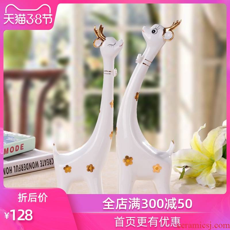 The Sequence of the strong ceramic crafts are giraffes couples contracted fashion household hallway decoration, lovely gift