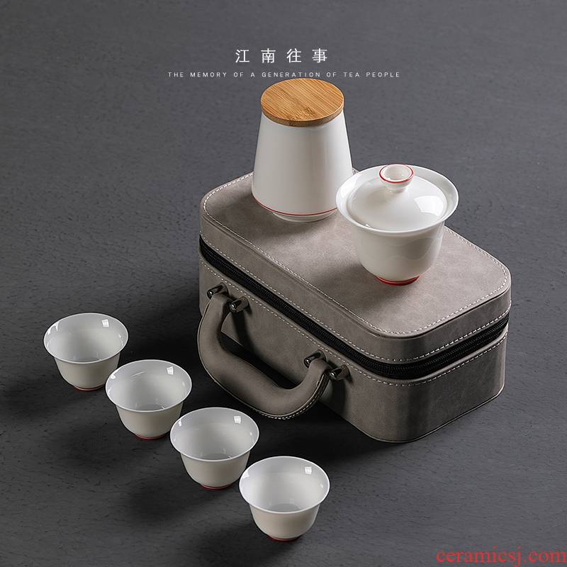 Jiangnan high - grade jade porcelain tea tureen travel portable package past a pot of kung fu tea set four cups of ceramics small suit